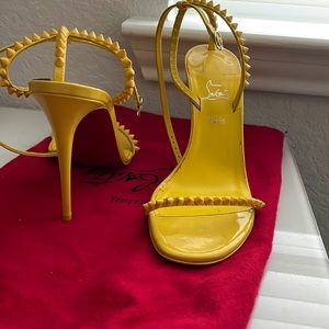 Christian Louboutin spiked women’s leather heels.